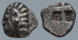 IONIA. Kolophon. (Circa 530/25-500 BC).
AR Tetartemorion (5.1mm 0.15g).
Obv: Archaic head of Apollo to left
Rev: Quadripartite incuse square punch....