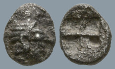 IONIA. Kolophon. (Late 6th century BC).
AR Tetartemorion (5.5mm 0.13g)
Obv: Archaic head of Apollo right.
Rev: Quadripartite incuse square.
SNG Ka...