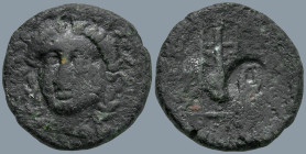 IONIA. Kolophon. (Circa 190-30 BC)
AE Bronze(18.7mm 4.8g)
Obv: Laureate head of Apollo slightly left.
Rev: Tripod with vessel (lebes); c/m Lyre.
M...