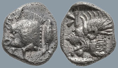 MYSIA. Kyzikos. (Circa 450-400 BC)
AR Obol (9mm 0.81g)
Obv: Forepart of boar left; tunny to right.
Rev: Head of roaring lion left; retrograde K in ...