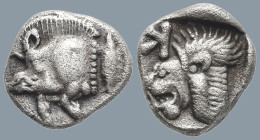 MYSIA. Kyzikos. (Circa 450-400 BC)
AR Obol (8.9mm 0.79g)
Obv: Forepart of boar left; tunny to right.
Rev: Head of roaring lion left; retrograde K i...