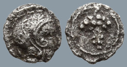 CILICIA. Soloi (410-375 BC)
AR Tetartemorion (6.3mm 0.2g)
Obv: Helmeted head of Athena right.
Rev: Grape bunch within linear circle.
BMC 24