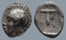 ARKADIA. Tegea. (Circa 423-400 BC).
AR Hemiobol (5.3mm 0.27g)
Obv: Helmeted head of Athena left.
Rev: Large T within shallow incuse square.
HGC 5,...