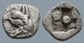 IONIA. Teos. (Circa 540-500 BC)
AR Tetartemorion (6.2mm 0.22g)
Obv: Head of griffin to left
Rev: Quadripartite incuse square with central pellet.
...