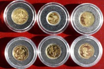 Alle Welt: Lot 6 Goldmünzen, überwiegend Motiv Fußball-Weltmeisterschaft Südafrika 2010 in einer Holzbox, dabei Palau, BVI, Isle of Man, Nauru, Ausral...