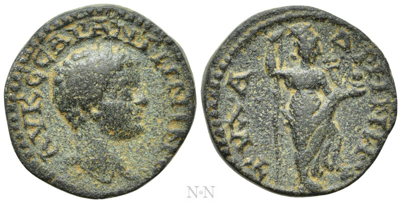 DECAPOLIS. Dium. Elagabalus (218-222). Ae. 

Obv: ΑΥ KЄPAC ANTWNIN[. 
Laureat...