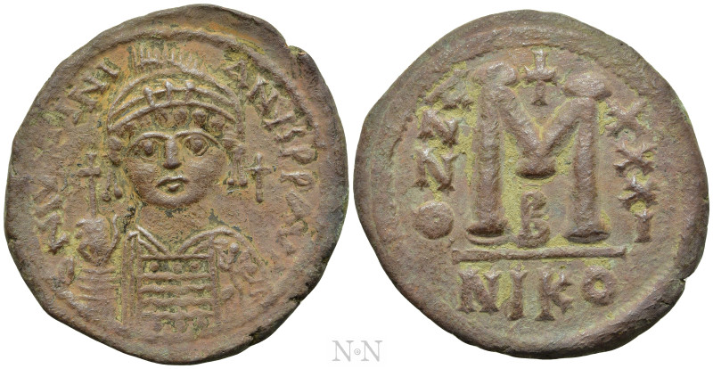 JUSTINIAN I (527-565). Follis. Nicomedia. Dated RY 31 (557/8). 

Obv: D N IVST...