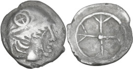 Celtic World. Gaul, Massalia. AR Obol, c. 5th century BC. Obv. Helmeted male head right; wheel on helmet. Rev. Wheel with four spokes. Depeyrot, Hellé...
