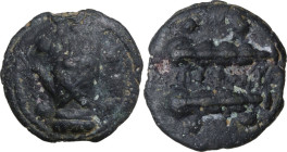 Greek Italy. Umbria, Tuder. AE Cast Triens. Sleeping dog series, c. 220-200 BC. Obv. Right hand, wearing caestus, flanked by four pellets. Rev. Two cl...