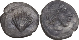 Greek Italy. Southern Apulia, Tarentum. AR Litra, c. 470-450 BC. Obv. Cockle shell. Rev. Female head right, within incuse circle. HN Italy 840; HGC 1 ...