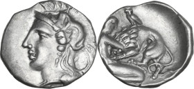 Greek Italy. Southern Apulia, Tarentum. AR Diobol, c. 380-325 BC. Obv. Head of Athena left, wearing crested helmet decorated with Skylla. Rev. Herakle...