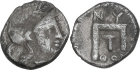 Greek Italy. Southern Lucania, Thurium. AR 1/4 Obol, c. 443-410 BC. Obv. Head of Athena right, wearing wreathed Attic helmet. Rev. Monogram consisting...