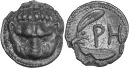 Greek Italy. Bruttium, Rhegion. AR Litra, 415-387 BC. Obv. Lion mask facing. Rev. PH. Olive sprig with two leaves. HN Italy 2499; HGC 1 1655. AR. 0.68...