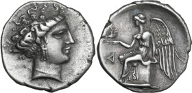 Greek Italy. Bruttium, Terina. AR Drachm, c. 350-300 BC. Obv. Head of nymph right, wearing necklace and earring with three pendants. Rev. Nike seated ...