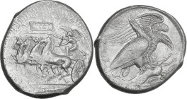 Sicily. Akragas. AR Tetradrachm. Silanos, magistrate, c. 407 BC. Obv. Nike, holding kentron in extended right hand, reins in left, driving fast quadri...