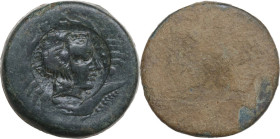 Sicily. Akragas. Punic Occupation (c. 405-392 BC). AE Countermarked Hemilitron, likely utilising an earlier eagle/crab issue as undertype. Obv. Head o...