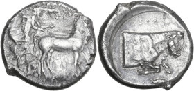 Sicily. Gela. AR Tetradrachm, c. 430-425 BC. Obv. Charioteer driving slow quadriga right; Nike flying right, crowning horses with wreath. Rev. ΓΕΛΑΣ. ...