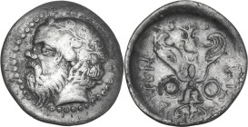Sicily. Katane. AR Litra, 410-405 BC. Obv. Head of Silenos left, wearing wreath of ivy. Rev. KATANAIΩN. Winged thunderbolt flanked by round shields. H...