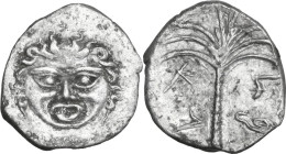 Sicily. Motya. AR Litra, c. 405-397 BC. Obv. Facing gorgoneion. Rev. Punic mṭv’ across field. Palm tree. HGC 2 936. AR. 0.85 g. 12.80 mm. R. Rare and ...