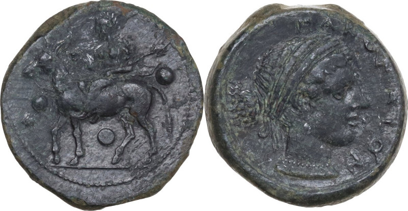 Sicily. Nakona. AE Tetras, c. 5th century BC. Obv. Silenos seated sidesaddle on ...