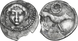 Sicily. Segesta. AR Litra, c. 455/0-445/0 BC. Obv. ΣΕΓΕΣΤΑΖΙΒ. Facing head of the nymph Segesta. Rev. Hound standing right; wheel of four spokes above...