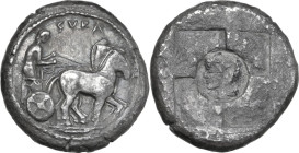 Sicily. Syracuse. AR Tetradrachm, First Democracy, c. 510-491 BC. Obv. Charioteer, holding reins in both hands, driving slow quadriga to right; ΣVRA a...
