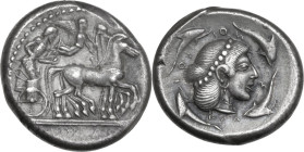 Sicily. Syracuse. Hieron I (478-466 BC). AR Tetradrachm, c. 475-470 BC. Obv. Charioteer, holding kentron and reins, driving slow quadriga right; above...