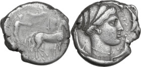 Sicily. Syracuse. Second Democracy (466-405 BC). AR Tetradrachm, c. 430-420 BC. Obv. Slow quadriga driven right by male charioteer holding goad; above...