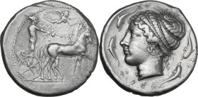 Sicily. Syracuse. Second Democracy (466-405 BC.). AR Tetradrachm, c. 420-415 BC. Obv. Charioteer driving slow quadriga right; above, Nike flying right...
