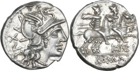 L. Iulius. AR Denarius, 141 BC. Obv. Helmeted head of Roma right; behind, XVI. Rev. The Dioscuri galloping right; below horses, L. IVLI; in exergue, R...