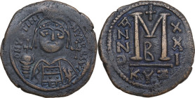 Justinian I (527-565). AE Follis. Cyzicus mint, 2nd officina. Dated RY 21 (547/8). Obv. DN YSTINI-ANYS PP (retroverse) AVI. Helmeted and cuirassed bus...