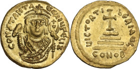 Tiberius II Constantine (578-582). AV Solidus, Constantinople mint. Obv. CONSTANT A-ЧC ЧIЧ FЄLIX. Crowned facing bust wearing consular robes, holding ...