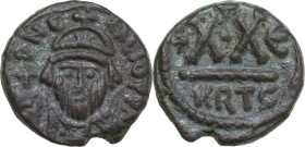 Heraclius (610-641). AE Half Follis, Carthage mint. Obv. DN E-RACLIO PP AV. Helmeted and cuirassed bust facing, holding globus cruciger. Rev. XX (mark...