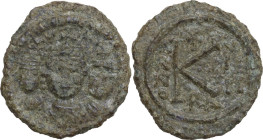 Heraclius (610-641). AE Half Follis, Ravenna mint, 618-619 AD. Obv. Facing busts of Heraclius (in centre), Heraclius Constantine (on right) and Martin...