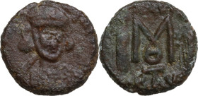 Constantine IV, Pogonatus (668-685). AE Follis, Ravenna mint. Obv. [DN COTINVS PP]. Bust three-quarter face to right, helmeted and cuirassed, and hold...