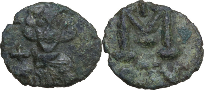 Justinian II (685-695). AE Follis. Ravenna mint. Obv. Crowned bust facing, weari...