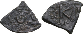 Leontius (695-698). AE Half-follis, Constantinople mint. Dated RY 2 (AD 696/7). Obv. Crowned bust facing, wearing loros, holdong globus cruciger. Rev....
