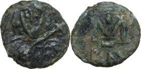 Tiberius III, Apsimar (698-705). AE Follis, Ravenna mint. Obv. Crowned facing half-length bust, holding spear and shield. Rev. Large M; cross above; i...