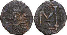 Philippicus, Bardanes (711-713). AE Follis. Constantinople mint. Obv. Philippicus standing facing, wearing crown and loros, holding eagle-tipped scept...