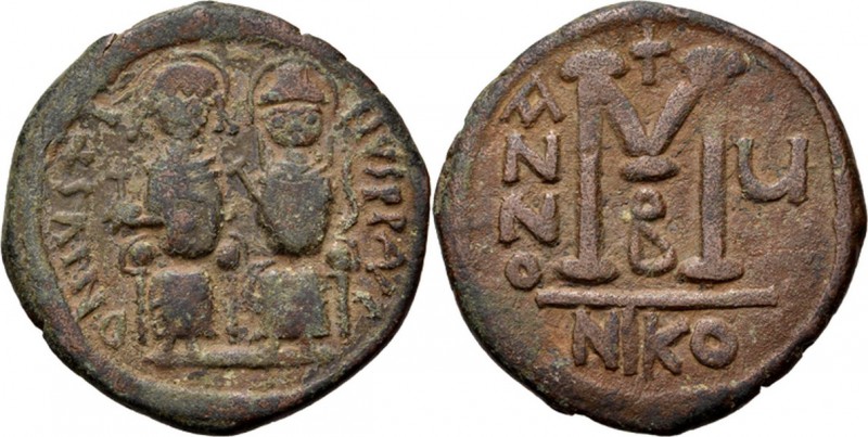 Æ Follis 569-570 AD, JUSTINUS II 565–578 Nicomedia. Justinus left and Sophia rig...