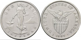 Philippines - Peso 1907 S, Silver San Francisco mint. Liberty standing beside anvil. Rev. eagle above stars and striped shield.KM. 17219.90 g Very fin...