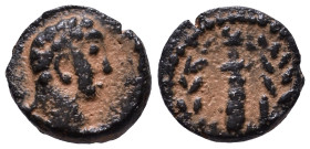 Uncertain Roman Provincial Coin. Bust of Heracles right. Rev. Club in wreath. 9mm, 1,00g *Repatinated*