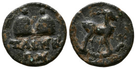 CARIA. Tabae. Pseudo-autonomous. Time of Nero 54-68. Stag standing right. Rev: TABHNΩN.Two Piloi surmounted by stars. BMC 38. AE 12mm, 1,17g