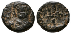 Justinian I, 527-565. Æ Nummus. 8mm, 0,62g *Repatinated*
