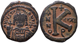 Justinian I, 527-565. Half follis AE 26mm, 8,74g *Repatinated*