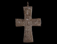 A BYZANTINE BRONZE CROSS PENDANT WITH CHRIST
Circa 10th-12th century AD.
The obverse shows Christ crucified with a small cross above his head. Above...