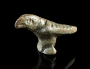 A SMALL ROMAN BRONZE FIGURE OF AN EAGLE
Circa 2nd-3rd century AD.
Perching eagle with folded wings, the feathers are indicated by deep grooves.
L 3...