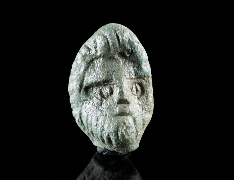 A ROMAN BRONZE HEAD OF A STATUETTE OF JUPITER
Circa 2nd-3rd century AD.
Jupite...
