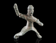 A ROMAN BRONZE STATUETTE OF A THRACIAN HORSEMAN 
Circa 2nd-3rd century AD. 
The hero with long hair tied into a knot is shown with cuirass and cloak...