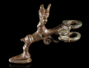 A LURISTAN BRONZE FIGURE OF AN IBEX
Circa 9th-8th century BC.
Figure of an ibex, with the hind legs set on a small base. Two large loops and a furth...